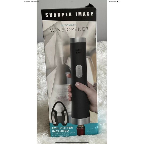 This Sharper Image handheld bottle opener is a must-have for any occasion. With - Picture 1 of 9